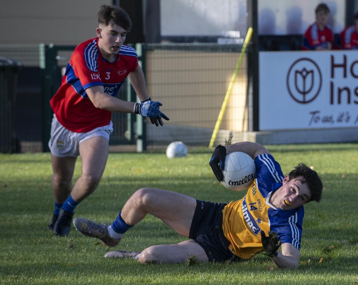 Denis O'Mullane De Le Salle Macroom under pressure from ISK's David Butler in the Corn Uí Mhuirí. Photo: Don MacMonagle Denis O'Mullane De Le Salle Macroom under pressure from ISK's David Butler in the Corn Uí Mhuirí. Photo: Don MacMonagle