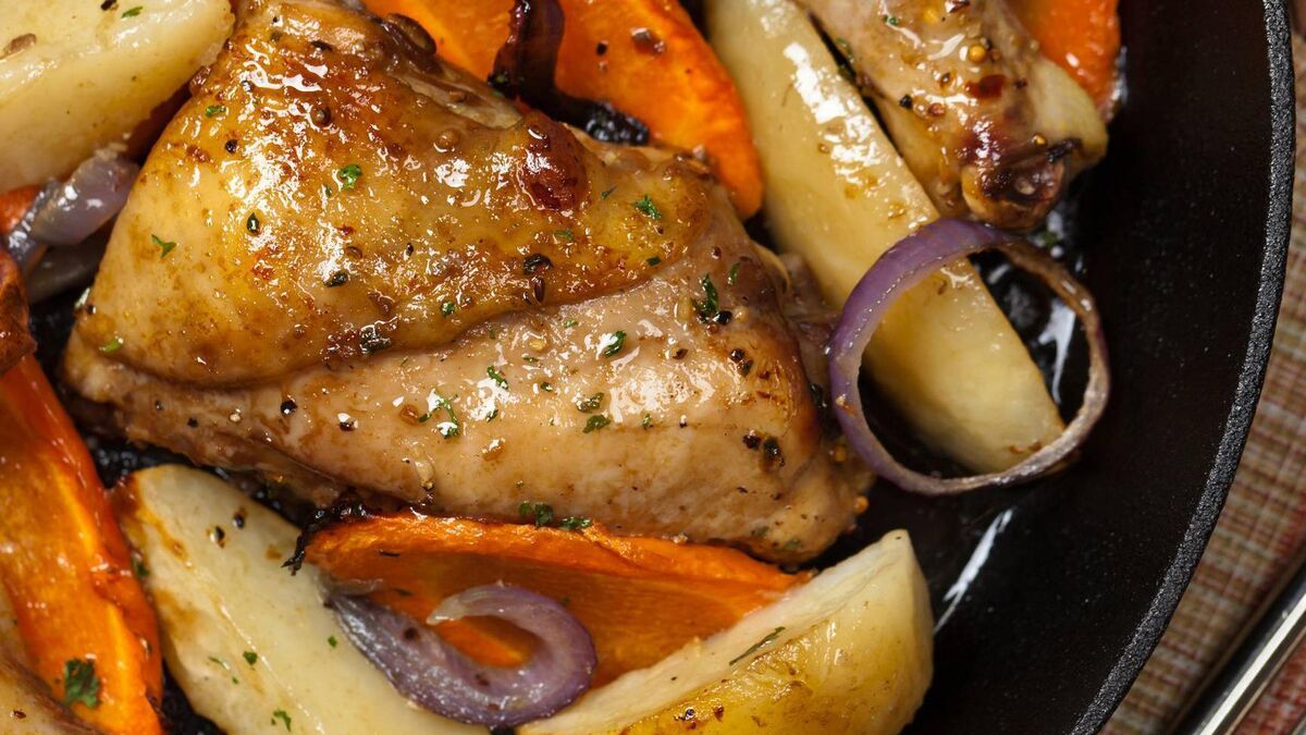 Roast chicken with herb dressing & crispy root veg