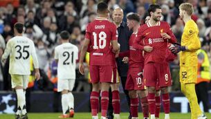 <p>SPECIAL NIGHT: Liverpool manager Arne Slot joins his players on the pitch at the end of the Champions League victory over Real Madrid. Picture: AP Photo/Jon Super</p>