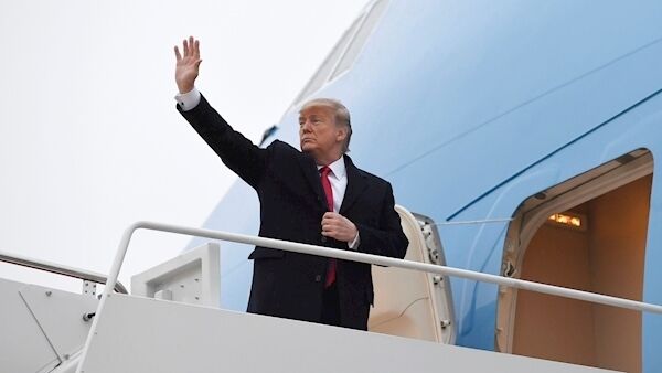 President Donald Trump waves from the top of the steps of Air Force One at Andrews Air Force Base in Md., Friday, Jan. 31, 2020. AP Photo/Susan Walsh. President Donald Trump waves from the top of the steps of Air Force One at Andrews Air Force Base in Md., Friday, Jan. 31, 2020. AP Photo/Susan Walsh.