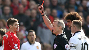 Gerrard red stuns Anfield