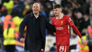 <p>BIG GAME: Liverpool manager Arne Slot and Liverpool's Northern Irish defender Conor Bradley celebrate after beating Real Madrid. Pic: OLI SCARFF/AFP via Getty Images.</p>