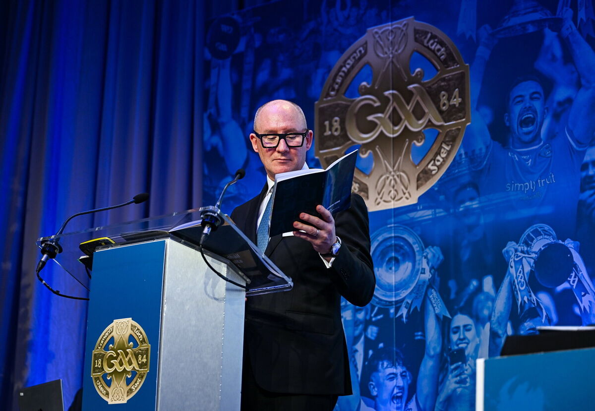 GAA Football Review Committee chairperson Jim Gavin reading from the GAA's official guide during the GAA Special Congress 2024.