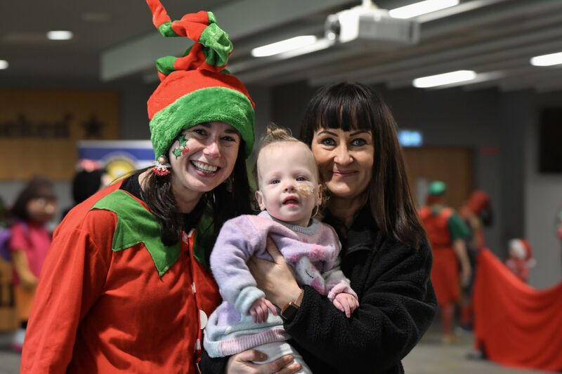 Olivia O’Keeffe, 20 months, and Kelly Hurton with Elaine the Elf.