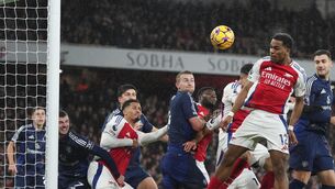 <p>Arsenal's Jurrien Timber heads the ball to score his side's first goal during the English Premier League soccer match against Manchester United. Picture: AP Photo/Kirsty Wigglesworth</p>