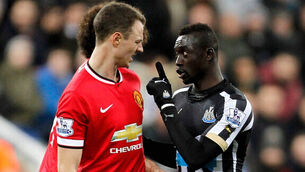 Cisse admits FA charge after alleged spit on Evans