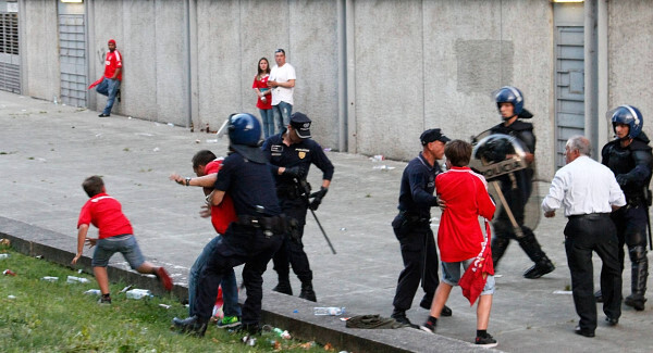 Footage of police beating football fan causes uproar in Portugal