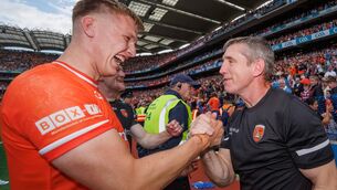 <p>Armagh’s Rian O'Neill and manager Kieran McGeeney celebrate their All-Ireland SFC final victory over Galway. Picture: ©INPHO/James Crombie</p>