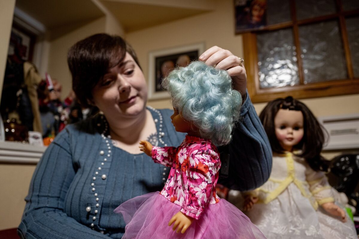  Joanna Carroll with her very first doll, ‘baby’ who has been her constant companion and comfort since the age of two. Picture: Chani Anderson