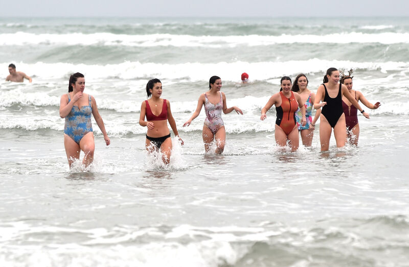 Braving the seas at the Christmas swim in 2024 in aid of Oliver Plunkett's GAA club at Inchydoney Beach in West Cork . Picture: Eddie O'Hare. Braving the seas at the Christmas swim in 2024 in aid of Oliver Plunkett's GAA club at Inchydoney Beach in West Cork . Picture: Eddie O'Hare.