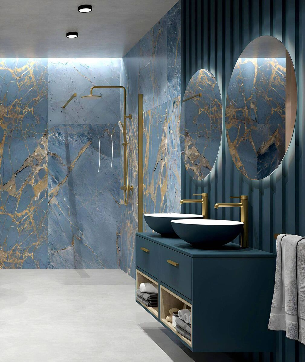 A fully tiled bathroom with ware by Sonas Bathrooms. Hotel chic at its finest.