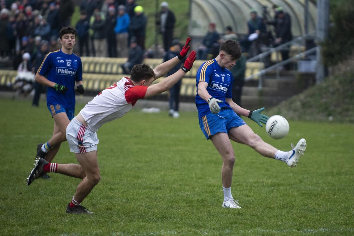 Tom Browne De La Salle tackled by JJ MacLiam Pobalscoil Chorca Dhuibhne. Picture: Don MacMonagle