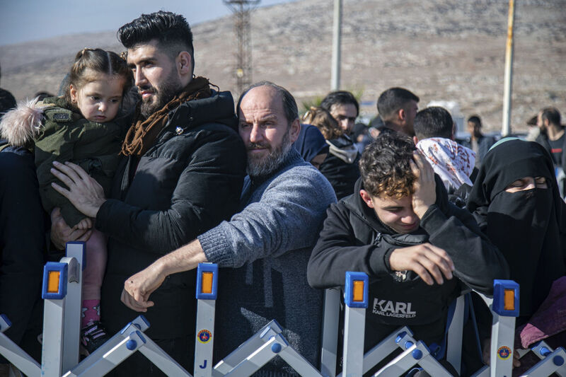 Returning Syrians wait to cross into the country from Turkey at the Cilvegozu border gate, near the town of Antakya. Picture: Metin Yoksu/AP Returning Syrians wait to cross into the country from Turkey at the Cilvegozu border gate, near the town of Antakya. Picture: Metin Yoksu/AP
