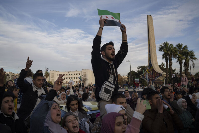Syrians gather in celebration days after the fall of Bashar al-Assad's government at the Umayyad Square in Damascus. Picture: Leo Correa/AP Syrians gather in celebration days after the fall of Bashar al-Assad's government at the Umayyad Square in Damascus. Picture: Leo Correa/AP