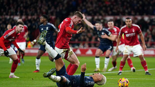 <p>FLASH POINT: Aston Villa's Morgan Rogers goes to ground after a challenge from Nottingham Forest's Elliot Anderson during the Premier League match at the City Ground, Nottingham. Pic: Joe Giddens/PA Wire</p>