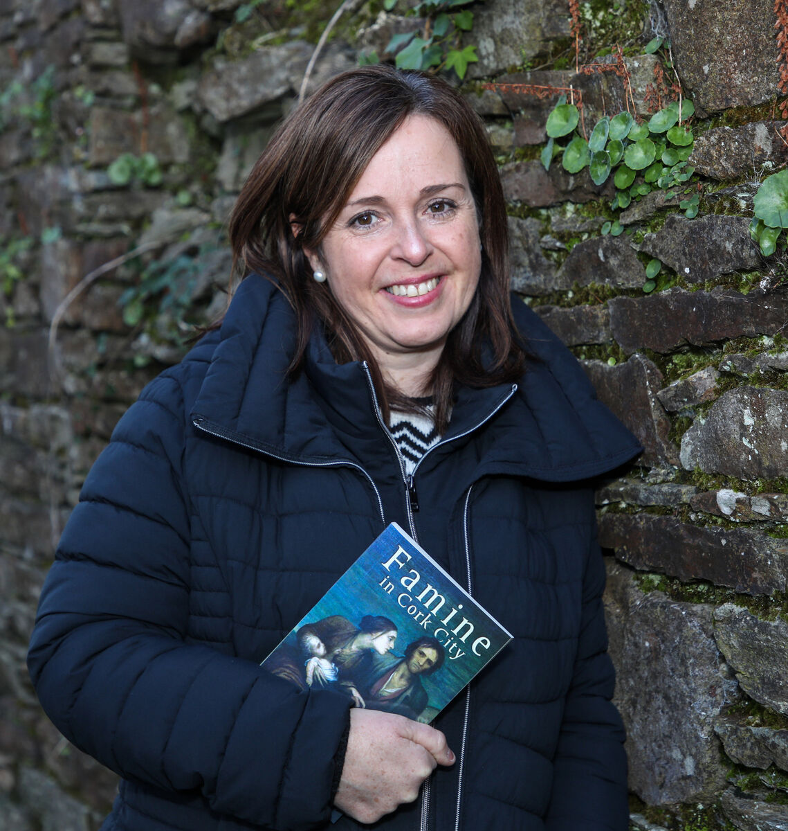 Michelle O'Mahony with her book Famine in Cork City. Picture: David Creedon