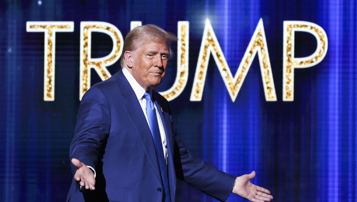 US president-elect Donald Trump takes the stage before he speaks at the FOX Nation Patriot Awards.  (AP Photo/Heather Khalifa)