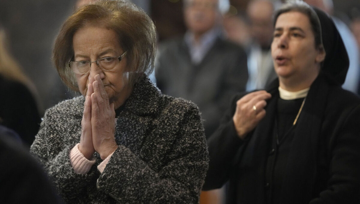 Syrian Christians pray during the first Sunday Mass since Syrian president Bashar al-Assad's ouster, at Mariamiya Orthodox Church in old Damascus. Picture: Hussein Malla/AP