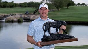 <p>Shaun Norris poses with the Alfred Dunhill Championship 2025 trophy at Leopard Creek Country Club in Malelane, South Africa. Picture: Warren Little/Getty Images</p>