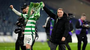 <p>HAIL HAIL: Celtic's Callum McGregor and manager Brendan Rodgers with the trophy. Pic: Andrew Milligan/PA Wire.</p>