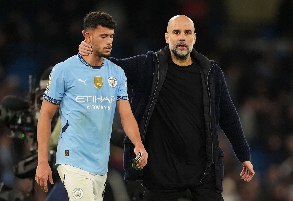 Manchester City's Matheus Nunes and manager Pep Guardiola after the defeat to Manchester United. Picture: Martin Rickett/PA Wire.