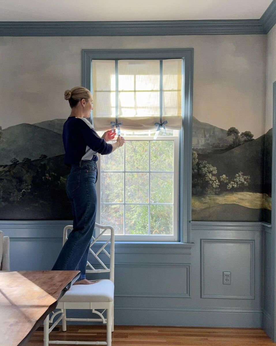 Phoebe adds blue bows to her blinds in the lead-up to Christmas.