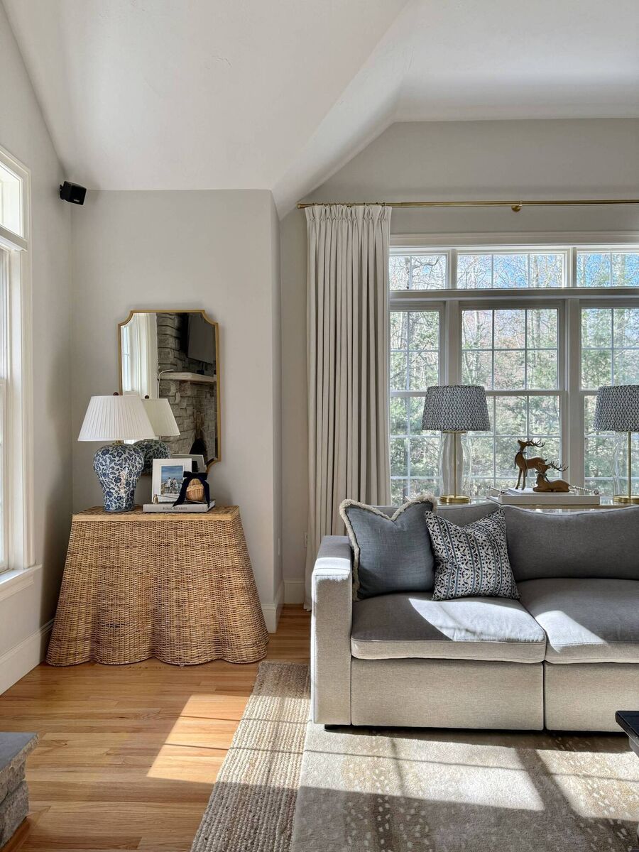 Rattan accents feature strongly in the living room, including orbs and deer ornaments.