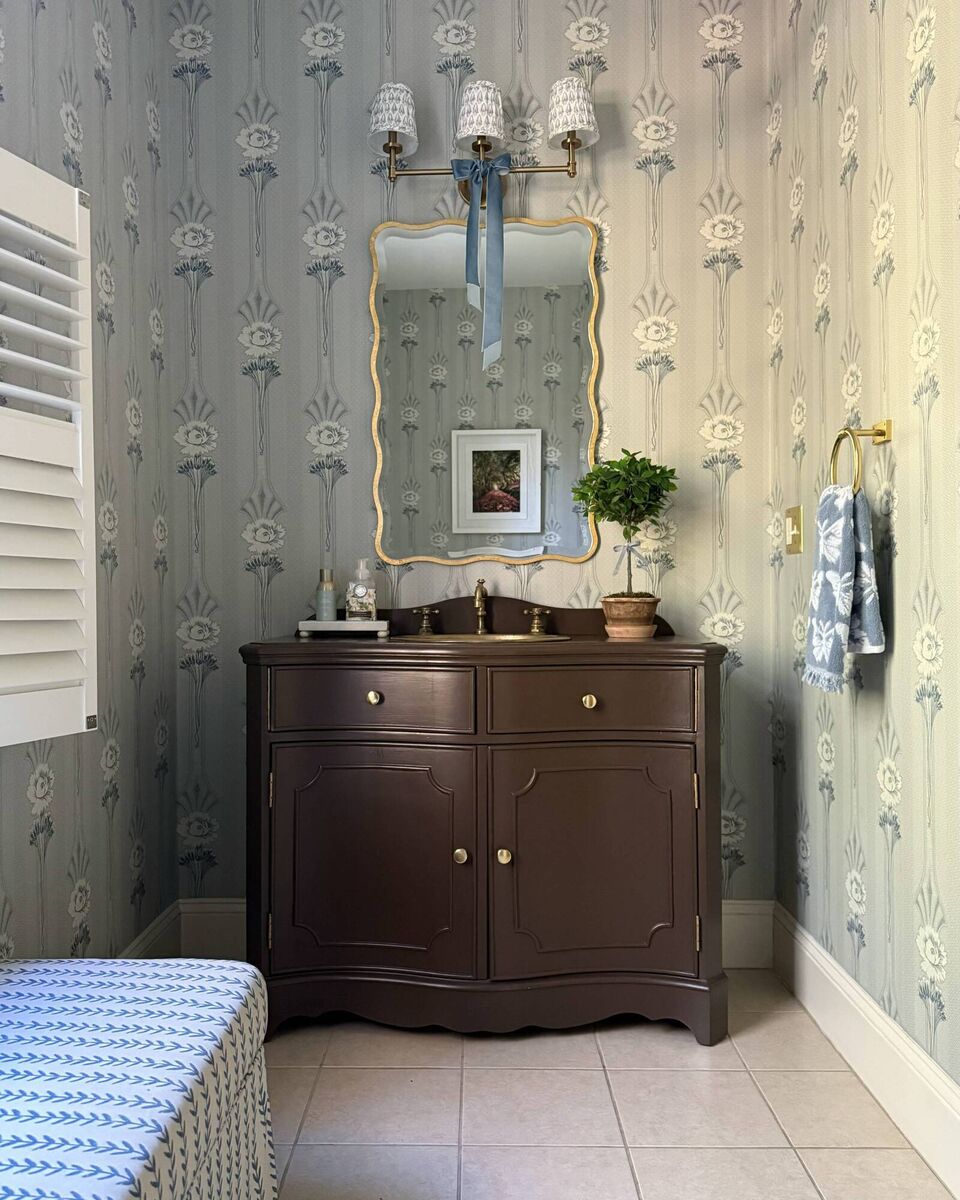 Powder room with vintage vanity.
