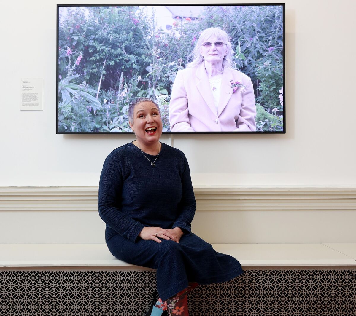 Amanda Dunsmore, from Killaloe, Co Clare, winner of the AIB Portrait Prize 2024 pictured with her winning portrait (Lydia, Dr. Lydia Foy, 2022). Picture: Robbie Reynolds.