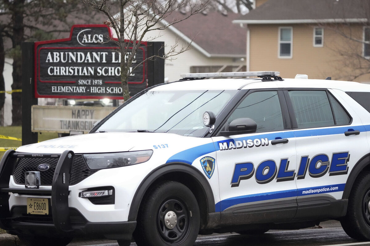 Emergency vehicles are parked outside the Abundant Life Christian School in Madison, Wis., where multiple injuries were reported following a shooting, Monday, Dec. 16, 2024. Picture: AP Photo/Morry Gash