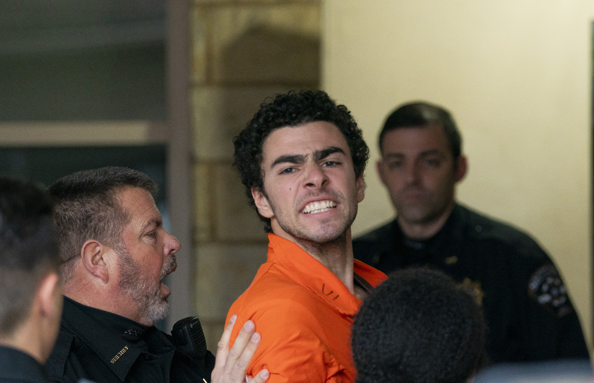 Suspect in health insurance boss killing charged with murder as act of terrorism