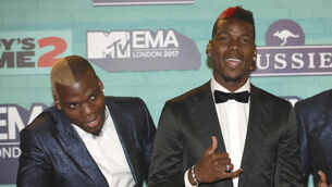Mathias Pogba, left, has been jailed for his part to extort money from his brother, Paul (Vianney Le Caer/Invision/AP)