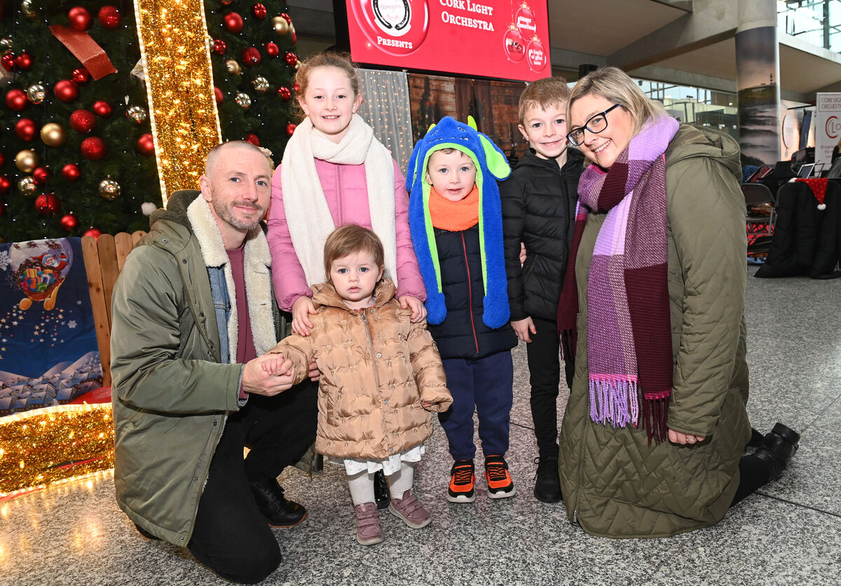There were departures as well as arrivals at Cork Airport, including Tadhg and Grace Crowley with children Alice, Florence, Charlie, and Jack who were heading off for a Christmas break. Picture: Larry Cummins
