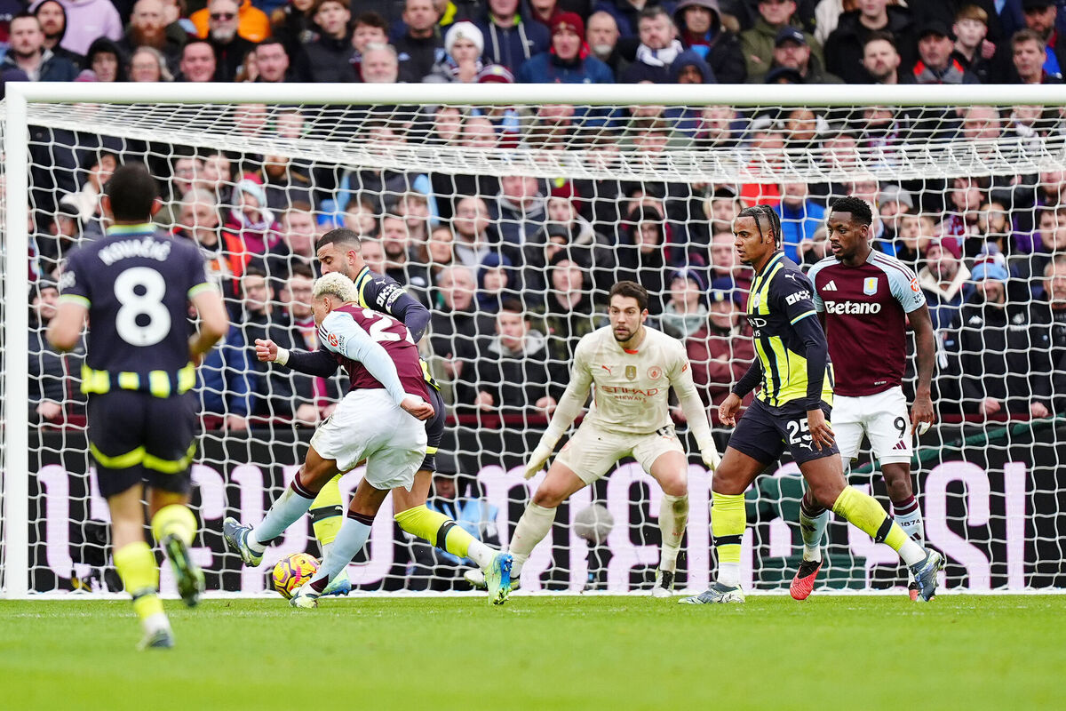 Aston Villa's Morgan Rogers scores his side's second goal. Pic: Mike Egerton/PA Wire.