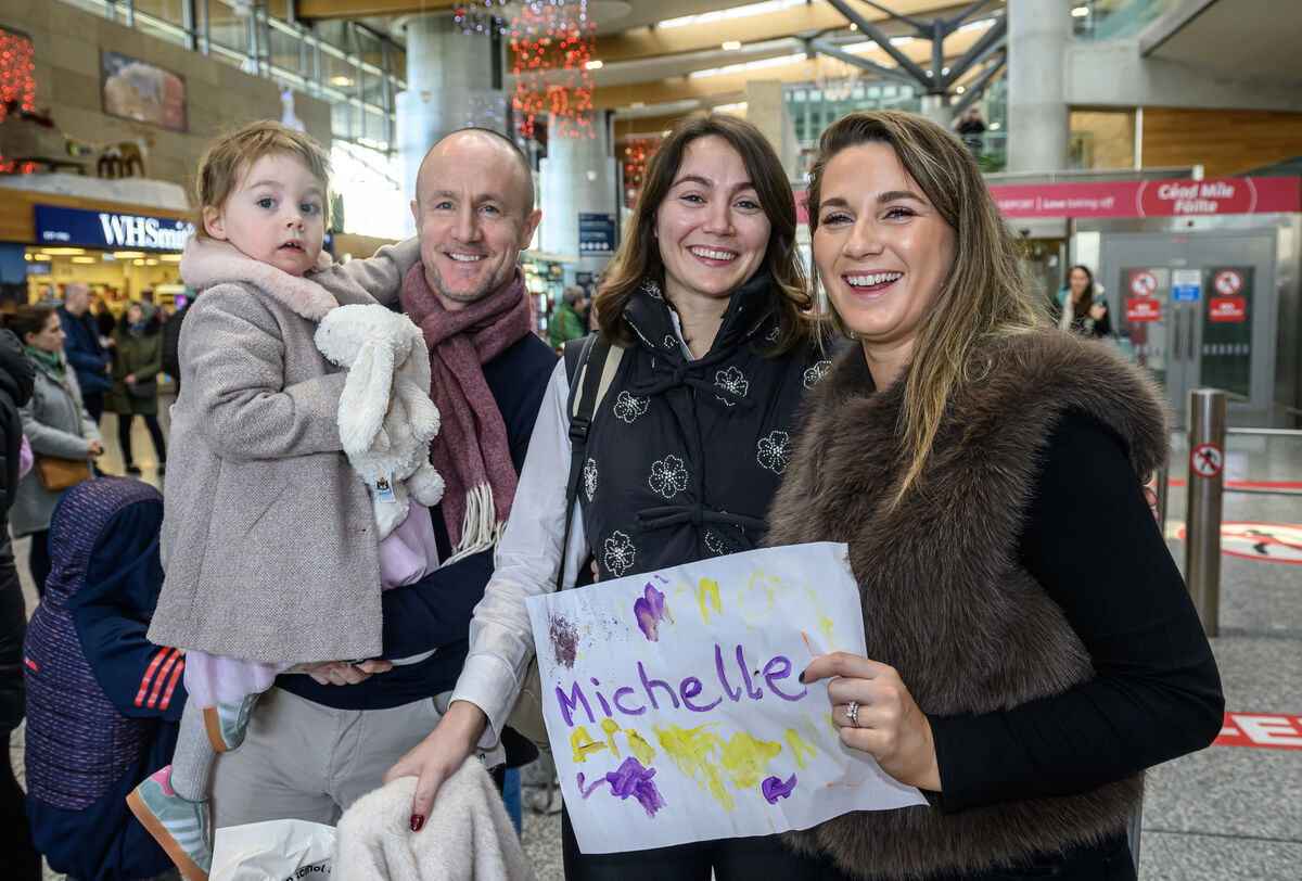  Michelle O'Mahony returning home from London is met at Cork Airport by her sister Katriona, Fraser and young Alexis. Picture Dan Linehan