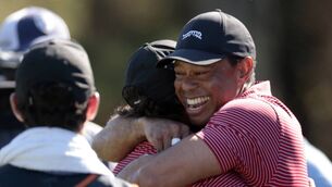 <p>ACE: Tiger Woods congratulates his son Charlie after he made a hole-in-one on the fourth during the secon round at the PNC Championship. Picture: Douglas P. DeFelice/Getty Images</p> <p>ACE: Tiger Woods congratulates his son Charlie after he made a hole-in-one on the fourth during the secon round at the PNC Championship. Picture: Douglas P. DeFelice/Getty Images</p>