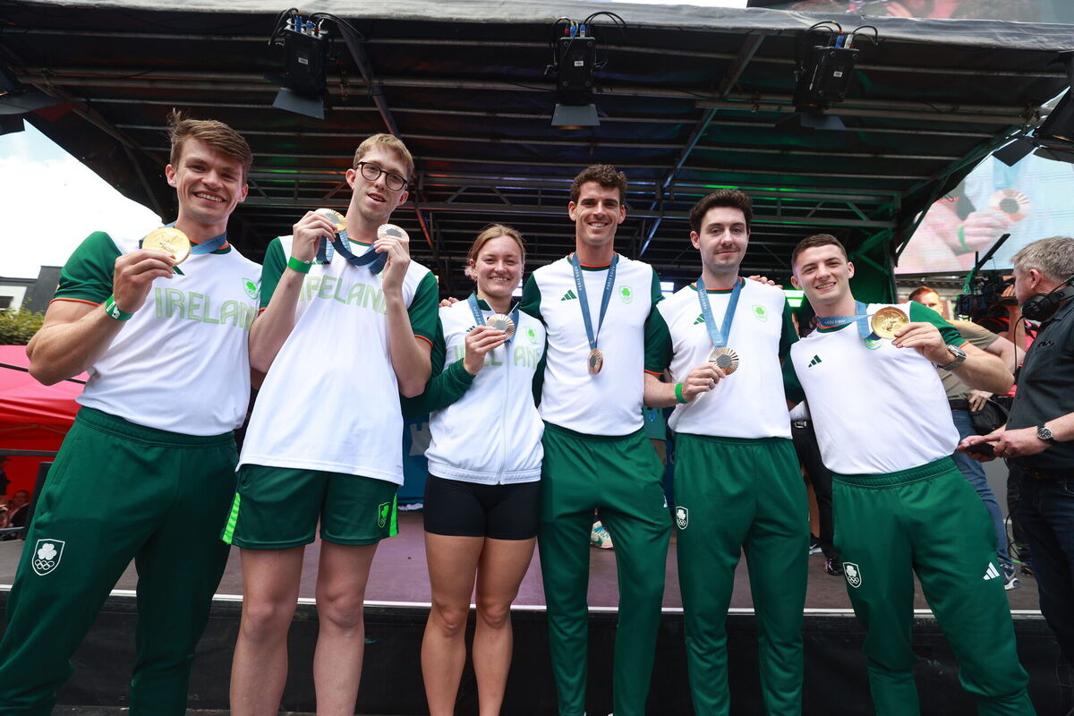 (Left to right) Ireland’s Fintan McCarthy, Daniel Wiffen, Mona McSharry, Philip Doyle, Daire Lynch and Rhys McClenaghan with their medals on O’Connell Street in Dublin during their homecoming in August. File photo: Liam McBurney/PA