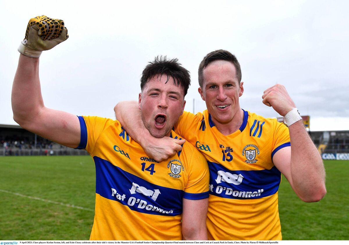 Clare players Keelan Sexton, left, and Eoin Cleary celebrate after their side's victory in the 2023 Munster SFC quarter-final against Cork. Photo by Piaras Ó Mídheach/Sportsfile