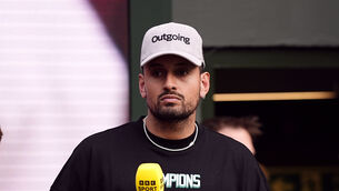 Nick Kyrgios worked in the media at Wimbledon this year (Aaron Chown/PA)