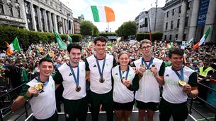 <p>Team Ireland members, from left, Rhys McClenaghan, Daire Lynch, Philip Doyle Mona McSharry, Daniel Wiffen and Fintan McCarthy are welcomed by supporters on O'Connell Street in Dublin, celebrating their remarkable achievements at the Paris 2024 Olympic Games. Photo by Ramsey Cardy/Sportsfile</p>