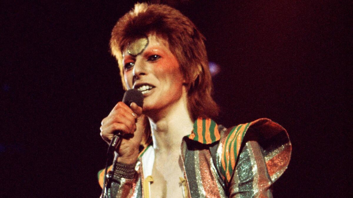 David Bowie performs on stage on his Ziggy Stardust/Aladdin Sane tour in London, 1973. Picture: Michael Putland/Getty Images David Bowie performs on stage on his Ziggy Stardust/Aladdin Sane tour in London, 1973. Picture: Michael Putland/Getty Images