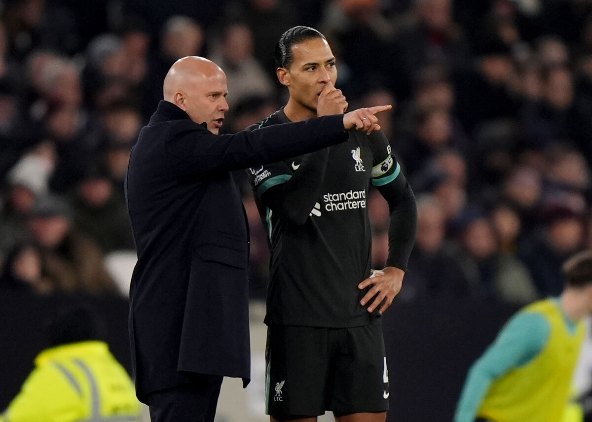 Liverpool manager Arne Slot (left) speaks with Virgil van Dijk Liverpool manager Arne Slot (left) speaks with Virgil van Dijk