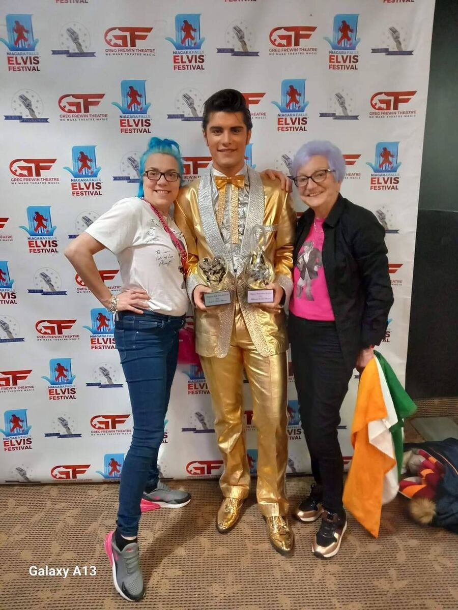 Elvis fans Lorna (left) and Margaret Holderied in Niagara Falls with Emilio Santoro the current Ultimate Elvis.