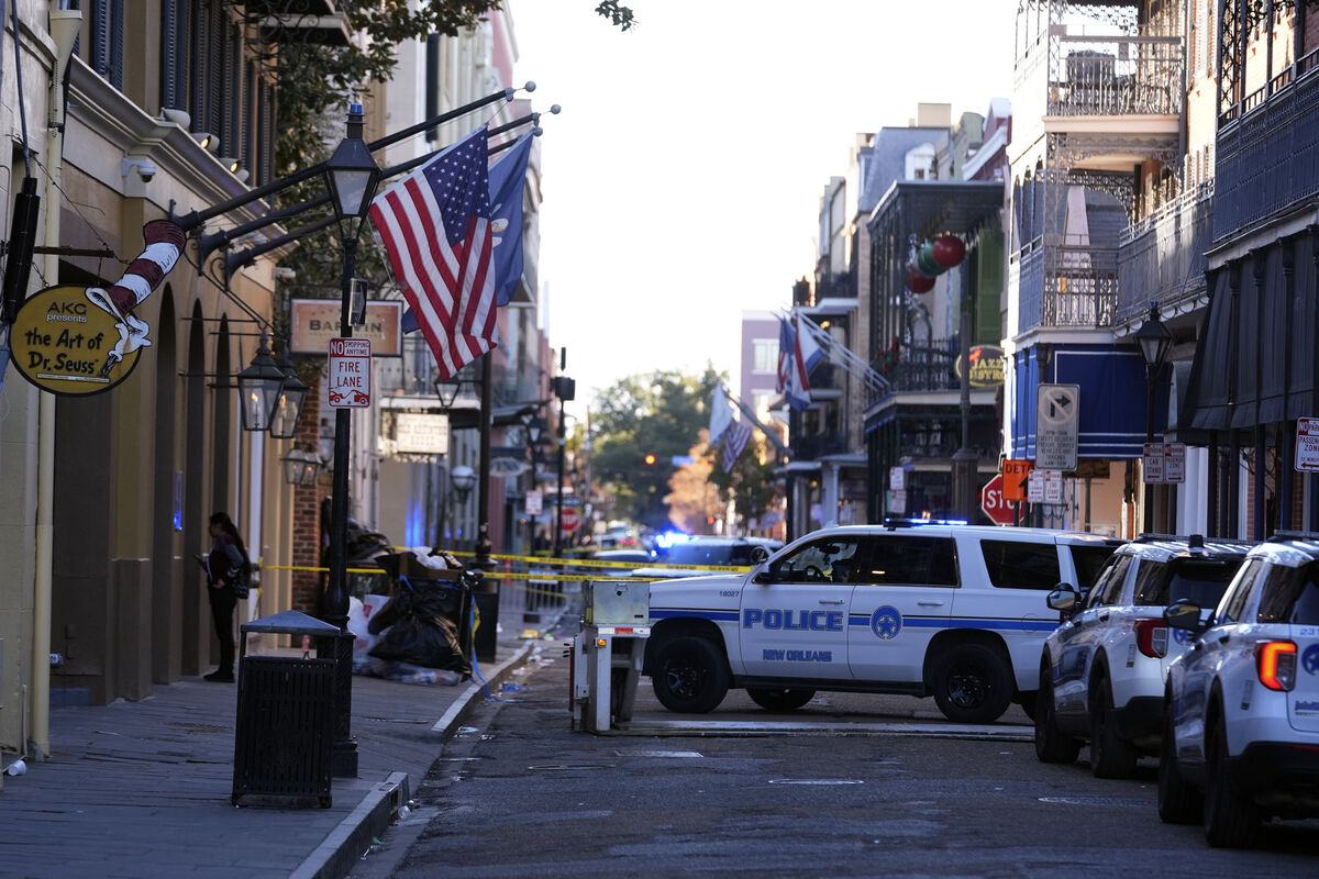 Emergency services attend after a vehicle drove into a crowd in New Orleans. Picture: Gerald Herbert/AP Emergency services attend after a vehicle drove into a crowd in New Orleans. Picture: Gerald Herbert/AP