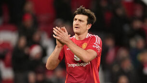 Harry Maguire has had his contract extended by another year at Manchester United (Martin Rickett/PA)