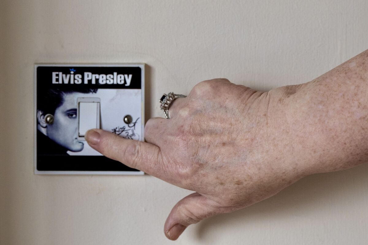 ‘Elvis even controls the lights’ jokes Catherine O'Brien as she flicks a switch in her Mitchelstown home decorated with an Elvis decal. Picture Chani Anderson