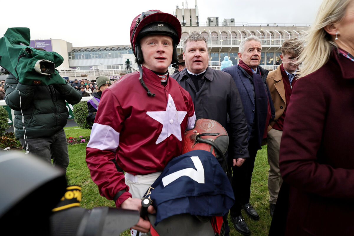 Trainer Gordon Elliott and Sam Ewing after winning the Neville Hotels Hurdle at the Leopardstown Christmas Festival.