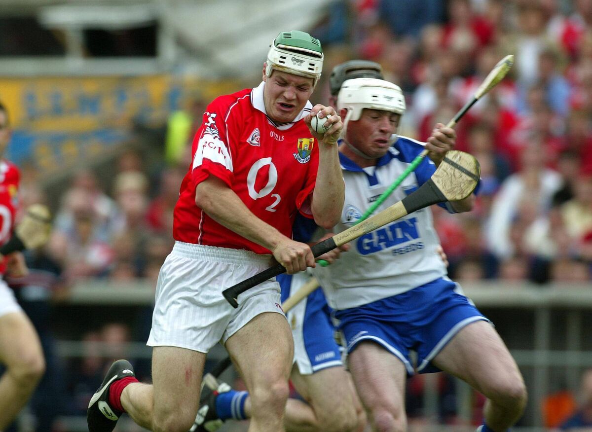 Niall McCarthy of Cork under pressure from Waterford's Brian Greene in 2003. Niall McCarthy of Cork under pressure from Waterford's Brian Greene in 2003.