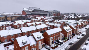 <p>MERSEY PARADISE: An aerial view of snow surrounding the ground ahead of the Liverpool v Manchester United. Pic: Peter Byrne/PA Wire.</p>