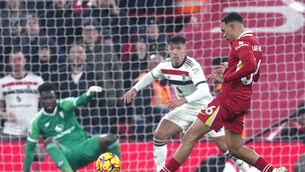 <p>Liverpool's Trent Alexander-Arnold attempts a shot on goal during the Premier League against Manchester United. Picture: Peter Byrne/PA Wire.</p>
